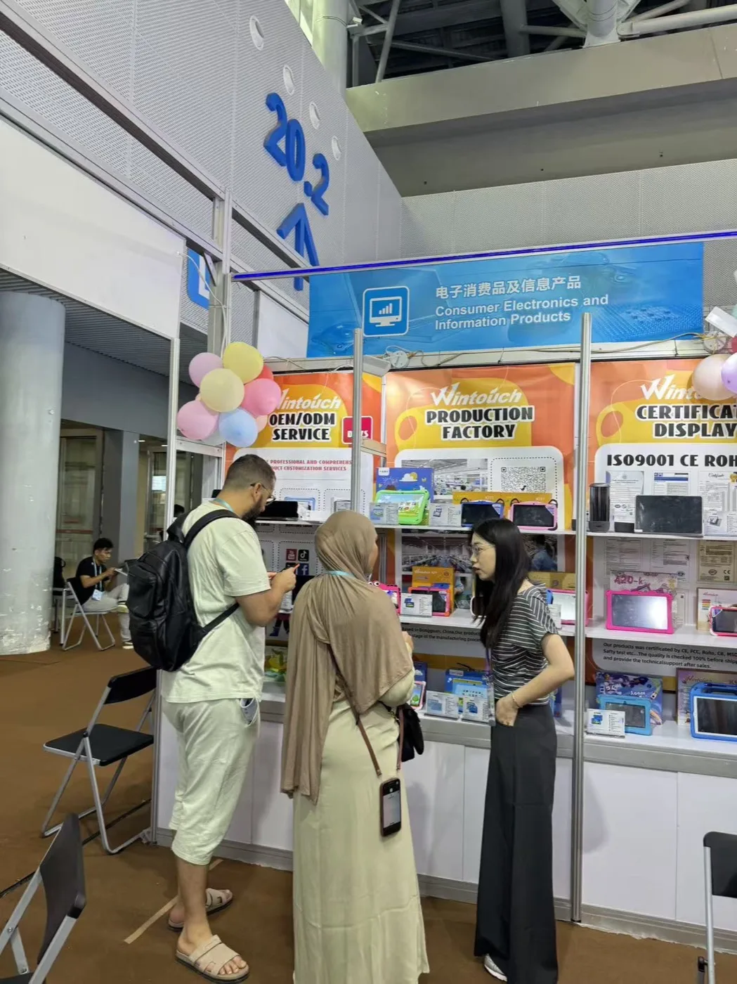 International buyers at the Wintouch booth — 139th Canton Fair, Guangzhou, April 2026
