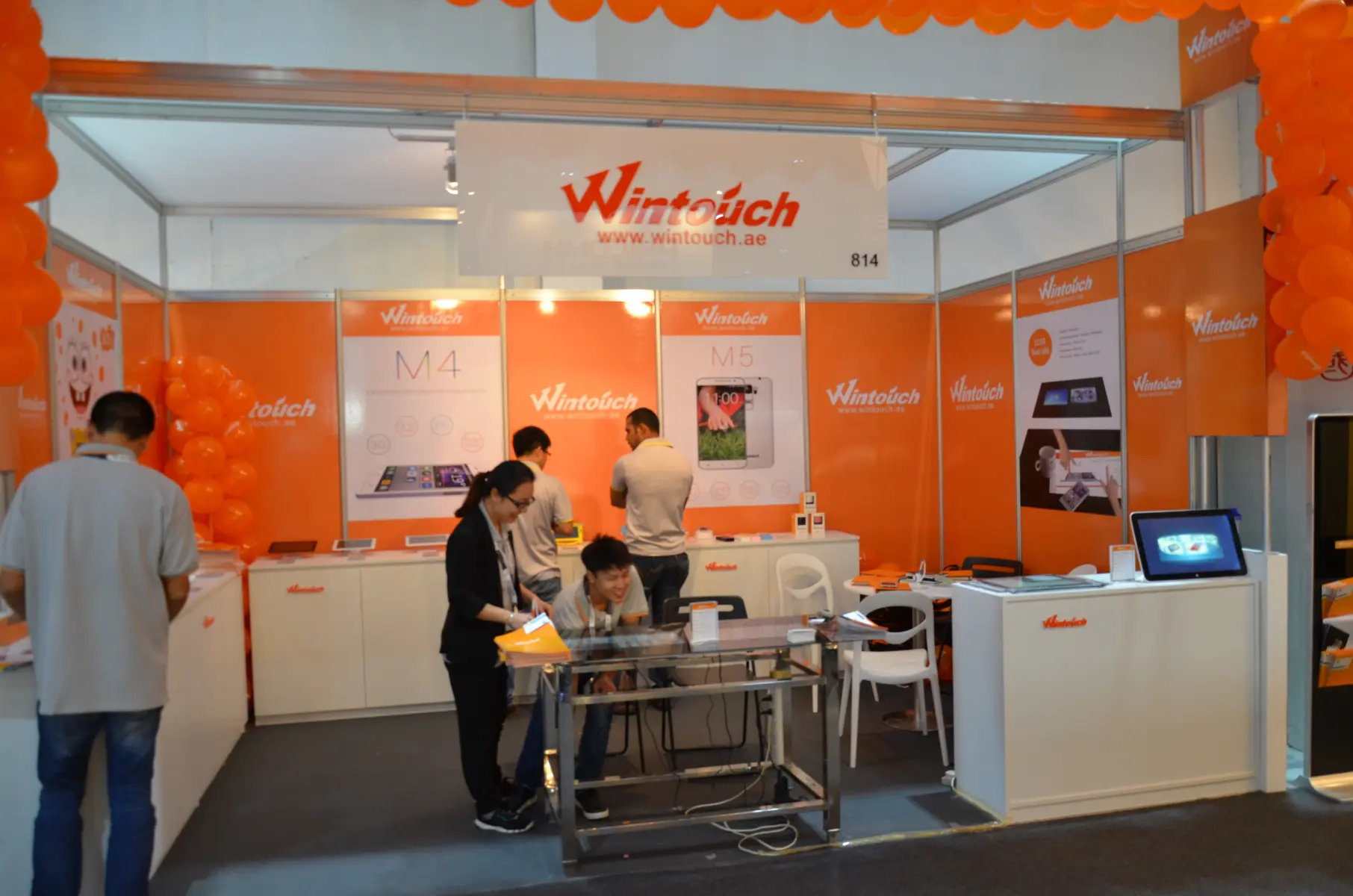 Wintouch tablet exhibition booth at GITEX Dubai 2014 — full stand view