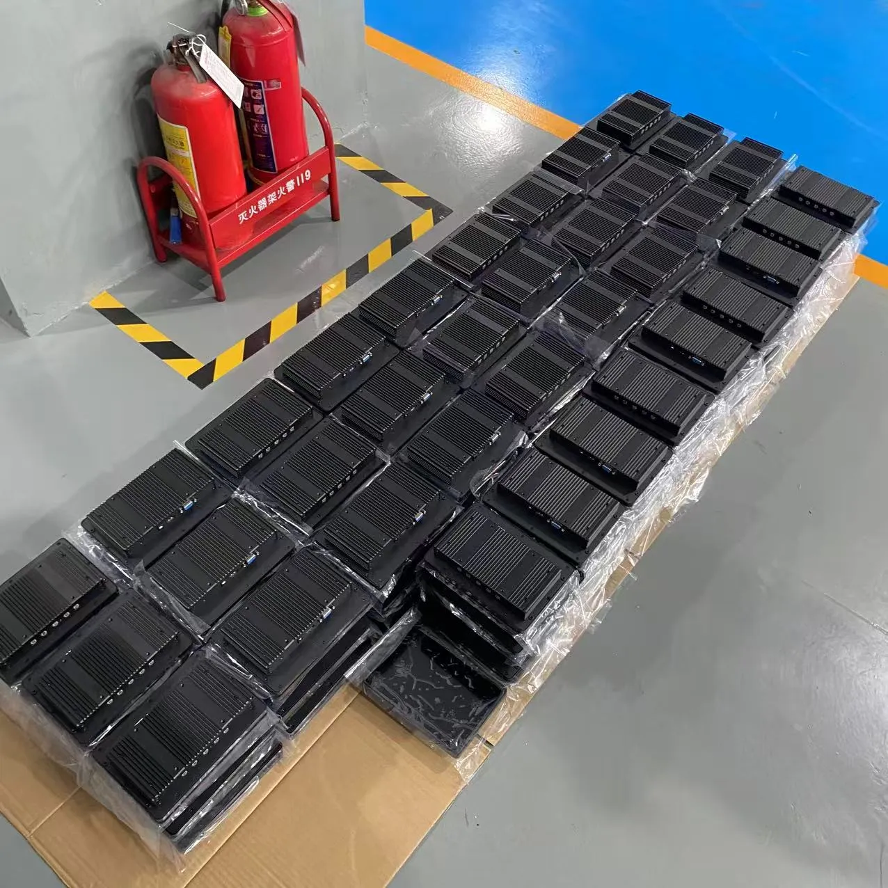 Wintouch factory — shipping dock with export cartons