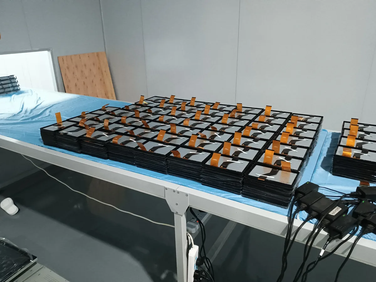 Tablets connected for aging and burn-in reliability testing — Wintouch Dongguan factory