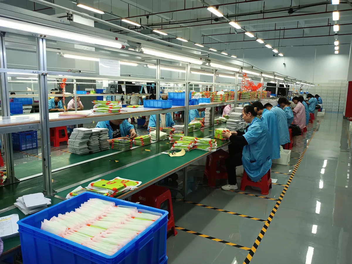 Wintouch Android tablet assembly production line with operators at work