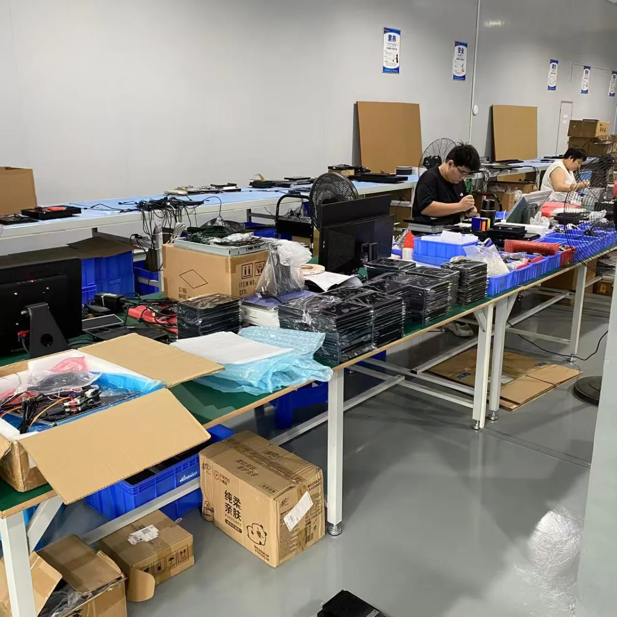Wintouch assembly and QA workshop with operators at inspection benches